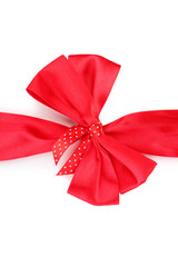 Red satin bow and ribbon isolated on white