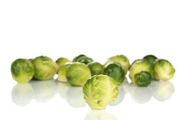 Fresh brussels sprouts isolated on white