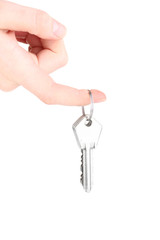Keys in hand isolated on white