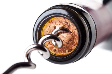 corkscrew with a bottle of wine