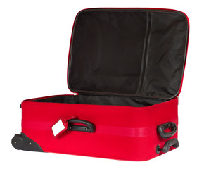 Open red suitcase with blank identification tag