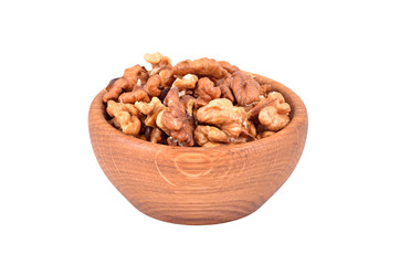 Walnut in wooden bowl, isolated on white background