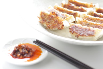 Chinese cuisine, dumpling with chili sauce