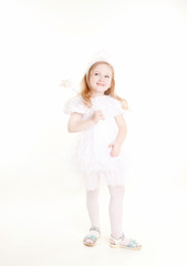 lovely little girl wearing white dress