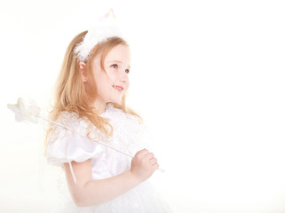 Fototapeta na wymiar lovely little girl wearing white dress