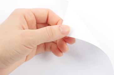 Blank sheet of paper with hand