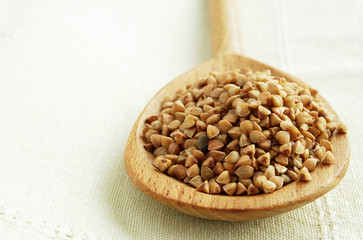 buckwheat in a wooden spoon