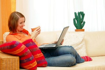 Young Woman with Laptop relaxing