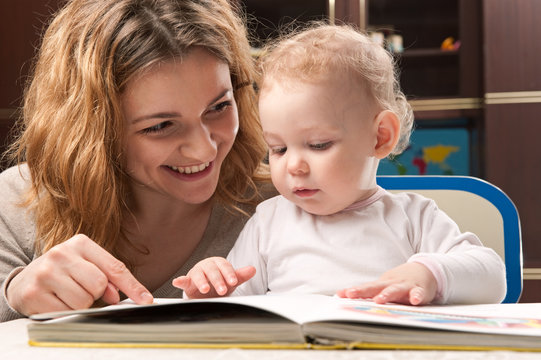 Mother And Baby Reading