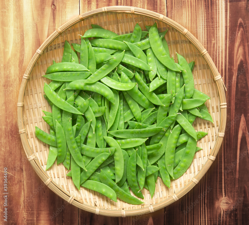 Sticker close up of a basket of snow peas