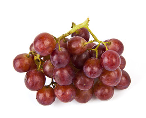 Red grapes on white background.