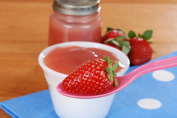 Organic strawberry baby food concept