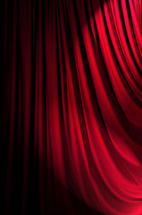 Brightly lit curtains in theatre concept