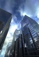 Fototapeta na wymiar Dramatic sky over modern building