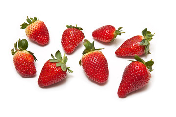 Strawberries isolated on a white studio background.