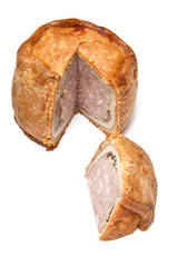 Melton Mowbray pork pie  isolated on a white studio background.