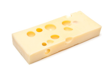 Emmental Swiss cheese isolated on a white studio background.