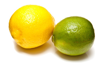 Lemons and Limes isolated on a white studio background.
