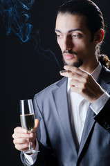 Man tasting wine in glass
