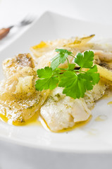 Fish with potatoes.