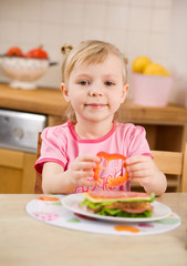 little girl with sandwich