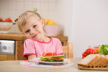 little girl with sandwich
