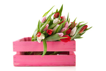 Pink crate with tulips