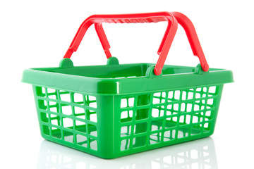 Fototapeta premium Green plastic shopping basket