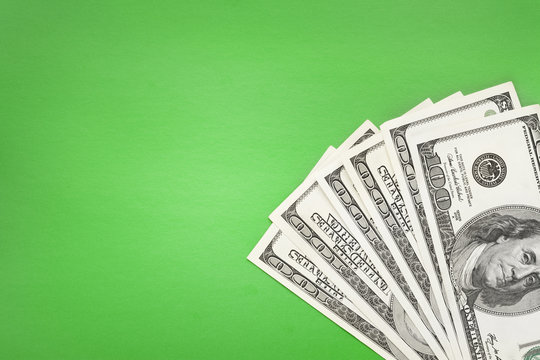 Money on green background