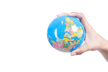 hand holding a globe