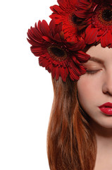 half of face girl with flowers in her hair