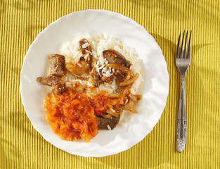 Rice with meat and stewed vegetables