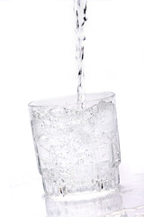 Obraz na płótnie Canvas Glass of water with ice