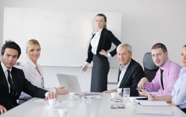 Group of young business people at meeting