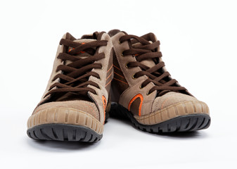 A pair of new hiking boots on white background