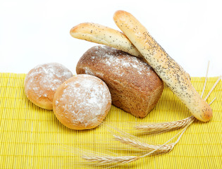 Fresh bread on a bamboo napkin.