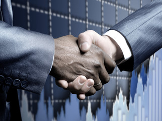 Handshake - Hand holding on black background