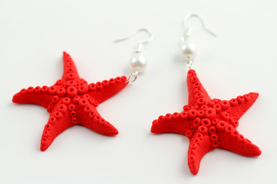 orecchini a forma di stelle marine rosse