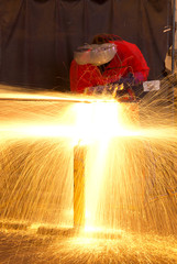 Multiple exposure of welder making sparks