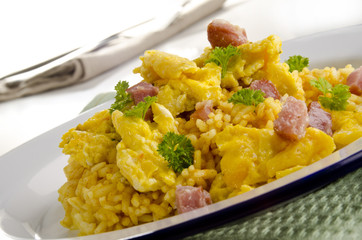 Long-grain curry rice with scrambled eggs and bacon