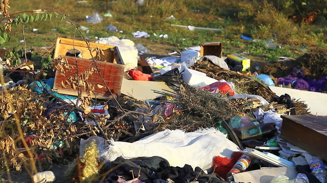 Illegal dumping, garbage just in the field
