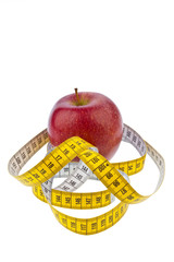 Apfel und Maßband für erfolgreiche Diät
