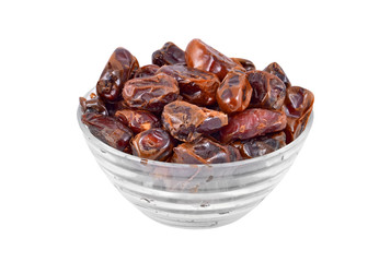 Delicious dried date fruit in glass bowl, isolated on white
