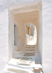 Traditional small street in Chora of Sifnos island Greece