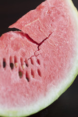 watermelon lying on a wooden table