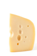 Piece of Maasdam cheese, white background