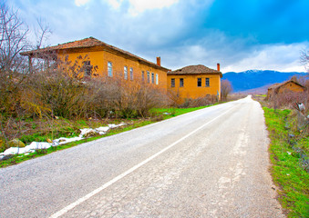 Fototapeta na wymiar Old houses in village Mavrokampos near Kastoria in Greece