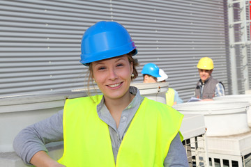 Portrait of smiling student girl in professional training