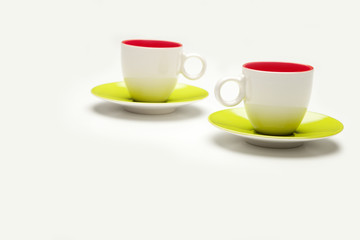 two cup and saucers on white background