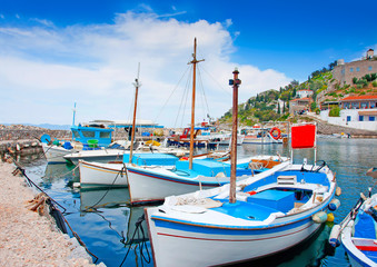 Fototapeta na wymiar Wooden fishing boats in Hydra island in Saronikos gulf in Greece